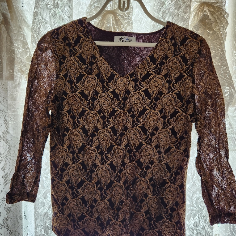 Womans three quarter sleeve shirt.